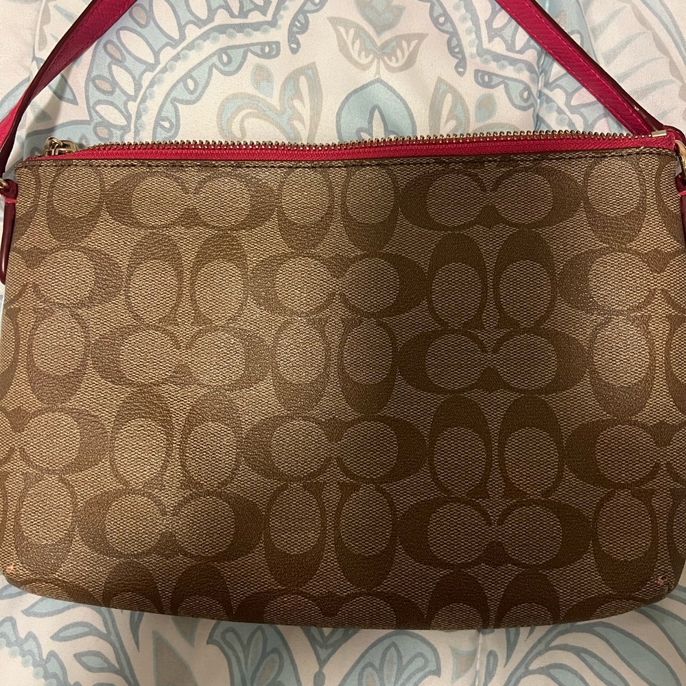 Brown and pink coach crossbody